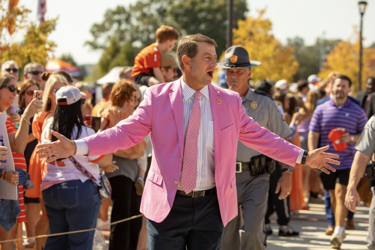 Head coach Dabo Swinney flashes in pink ahead of Clemson's home matchup against SMU.