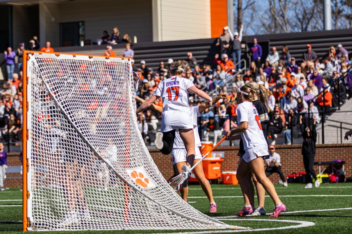 Anna Brown and teammates celebrate a goal against Vanderbilt on Feb. 7.