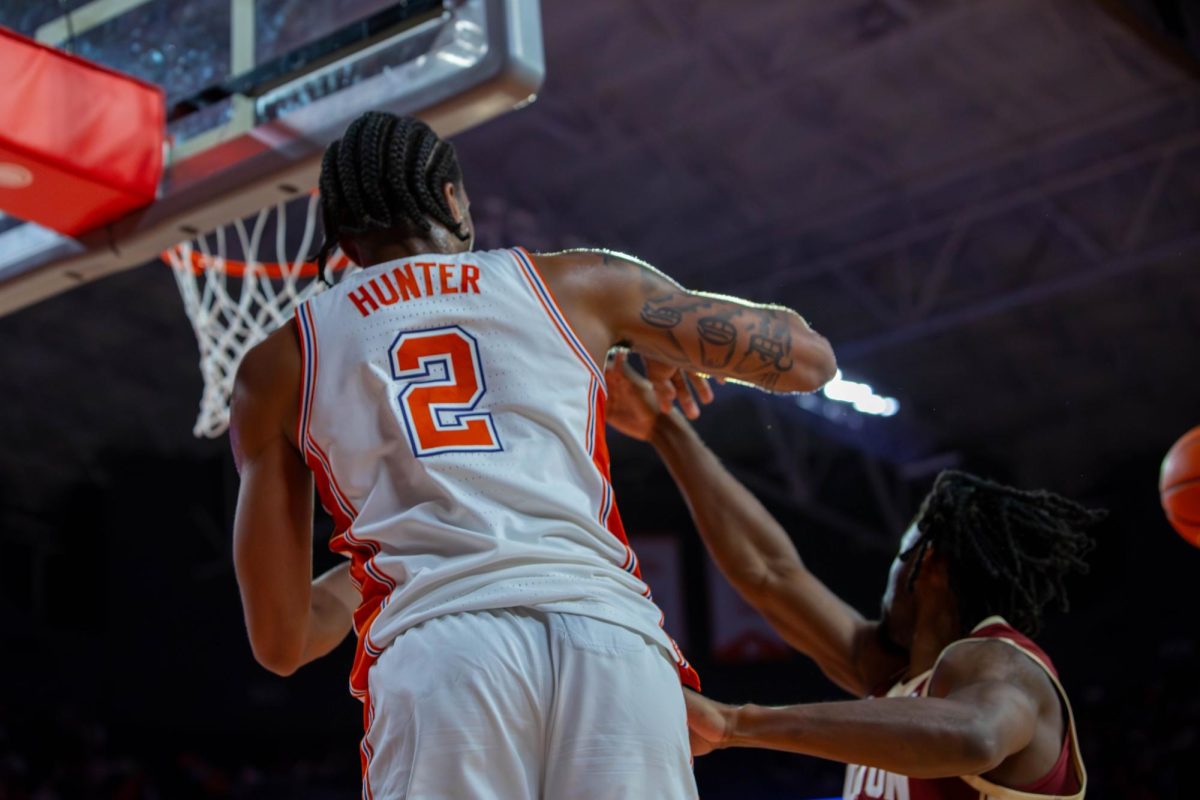 Senior guard Dillon Hunter inbounds the ball against Boston College on Jan. 13, 2025.