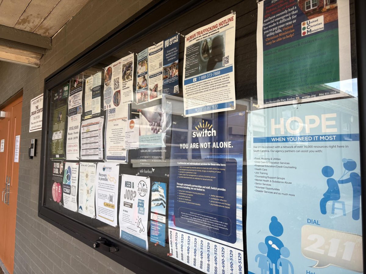 A community board at The Dream Center in Easley, South Carolina, shares information and contacts for homeless individuals in need of assistance.