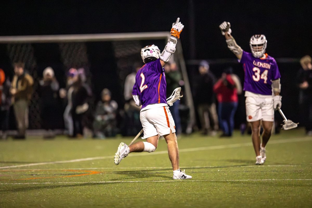 Landen Snyder celebrates a goal with Tyler Superczynski against No. 14 Florida on Jan. 30.