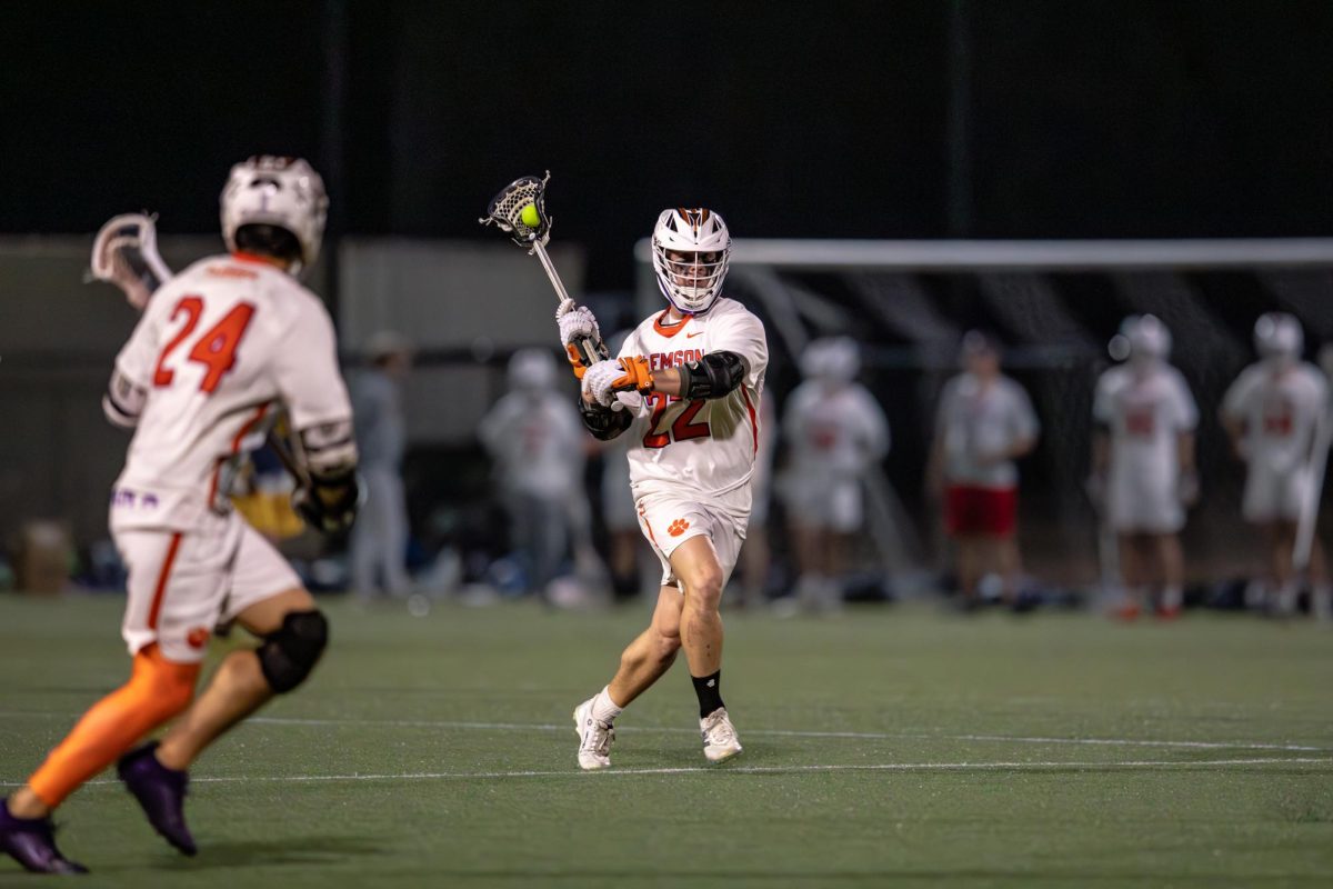 Ty Bleach assists an Aidan McNulty goal against West Virginia on Feb. 20.