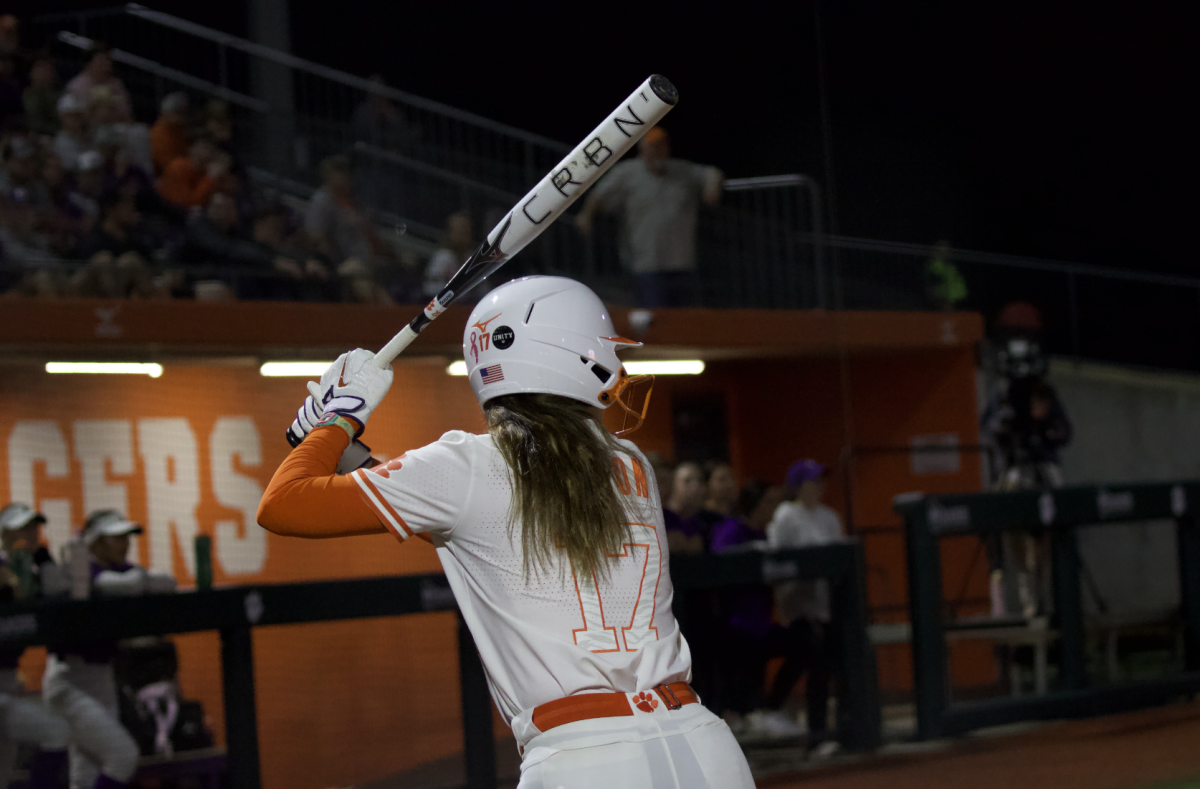 Ava Wilson aims for the fences against Furman.